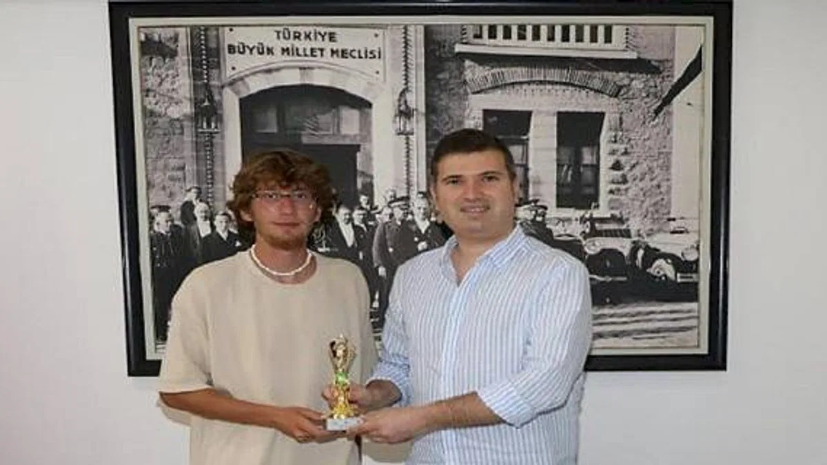 Tayfun Canlı, şampiyon ile buluştu!