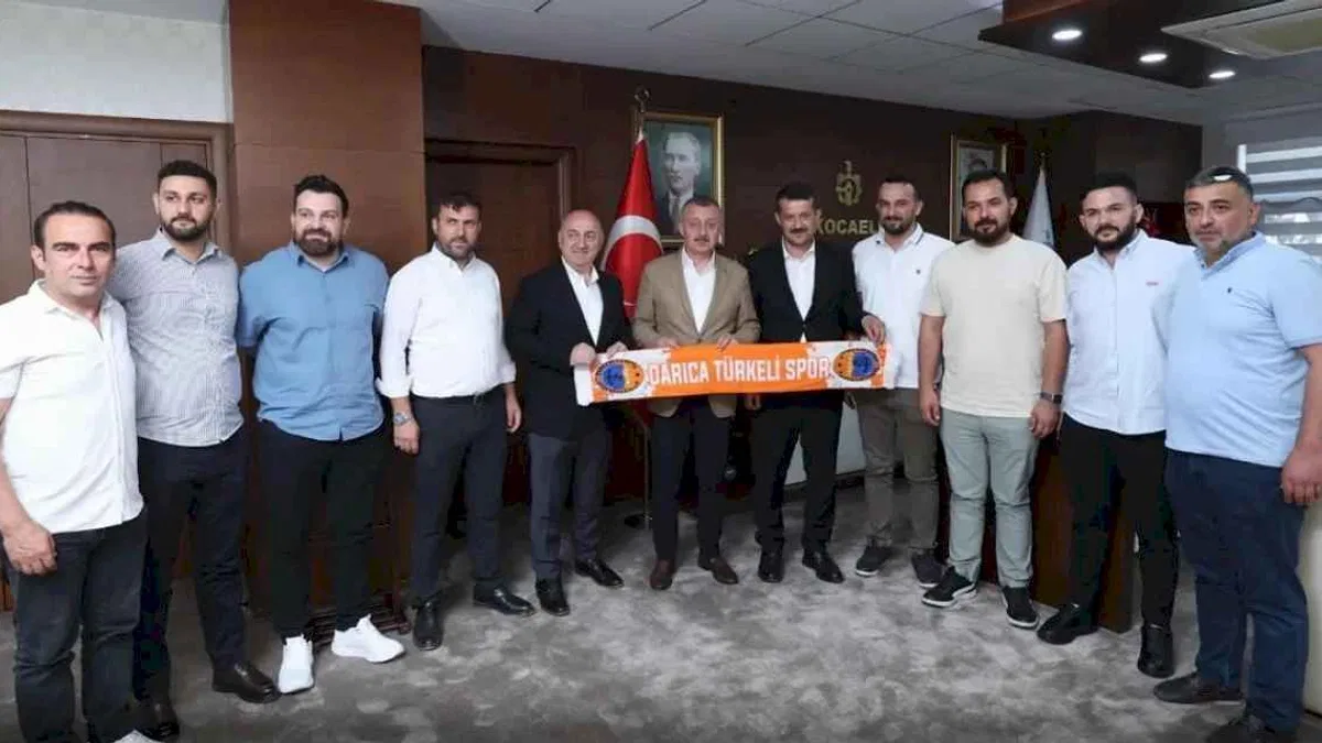 Başkan Büyükakın şampiyon sporcuları ağırladı