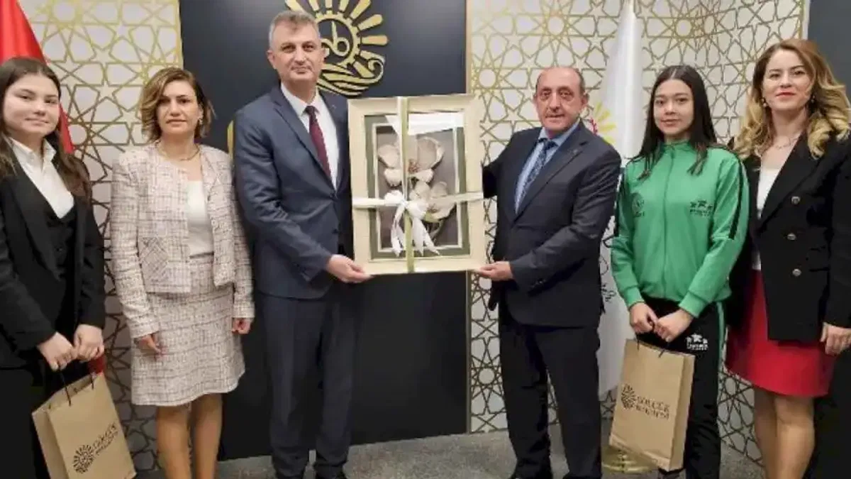 Başkan Sezer'e başarılı sporculardan ziyaret